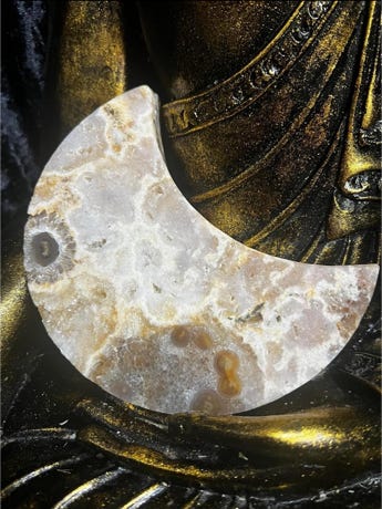 Pink amethyst from Brazil cut inot a waxing moon